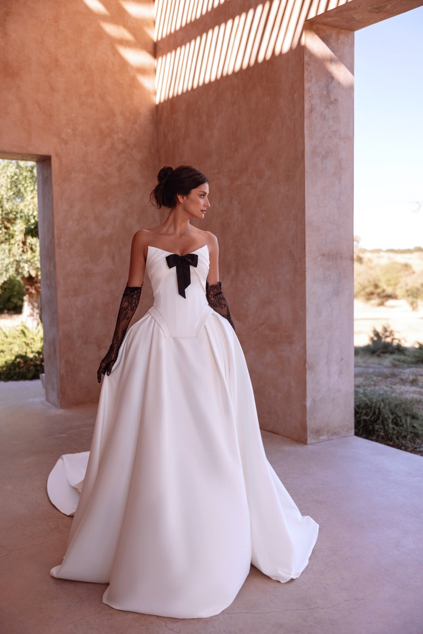 Strapless Ball Gown Wedding Dress with Black Bow and Corset