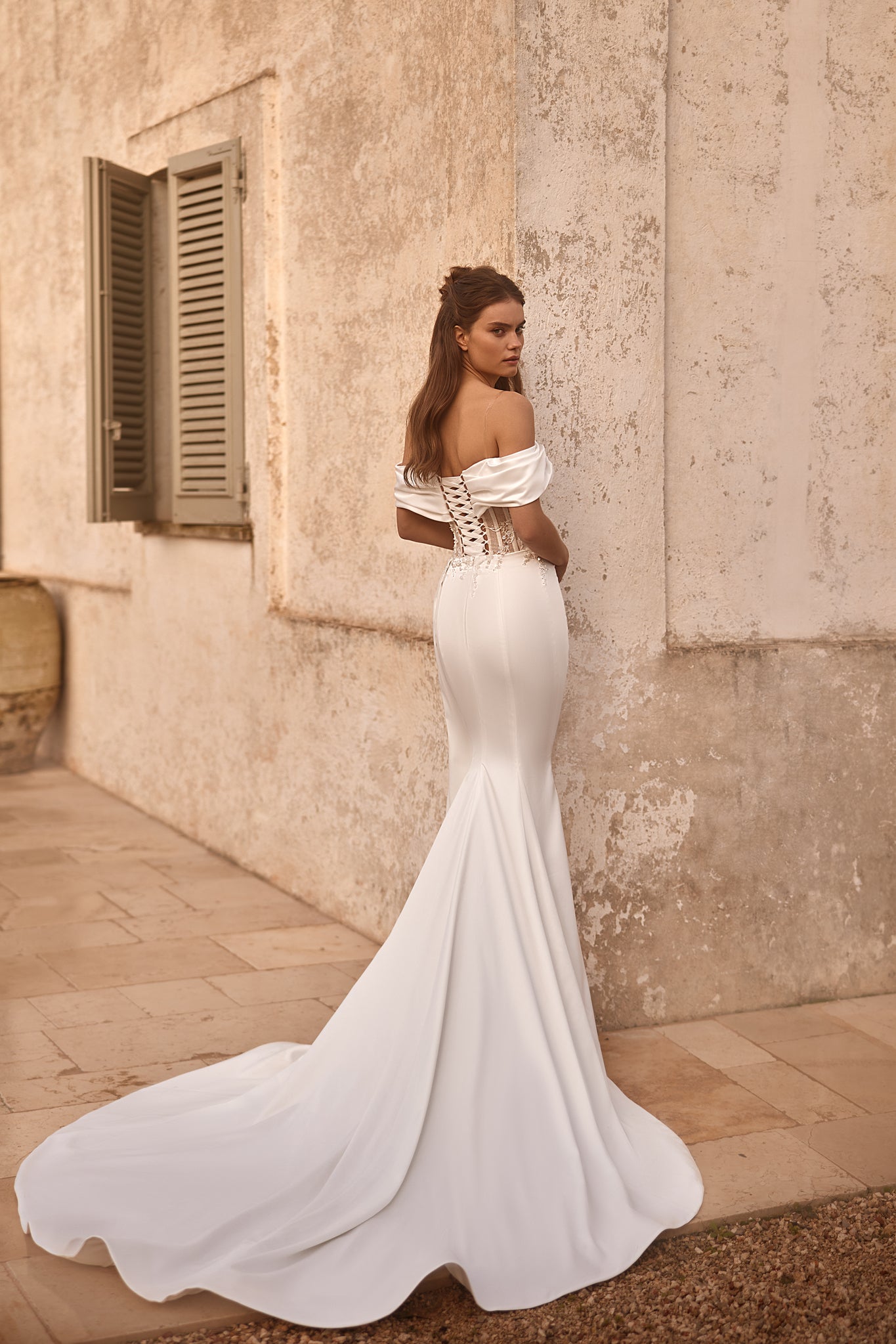 WEDDING DRESS WITH GENEROUS SLIT AND CORSET