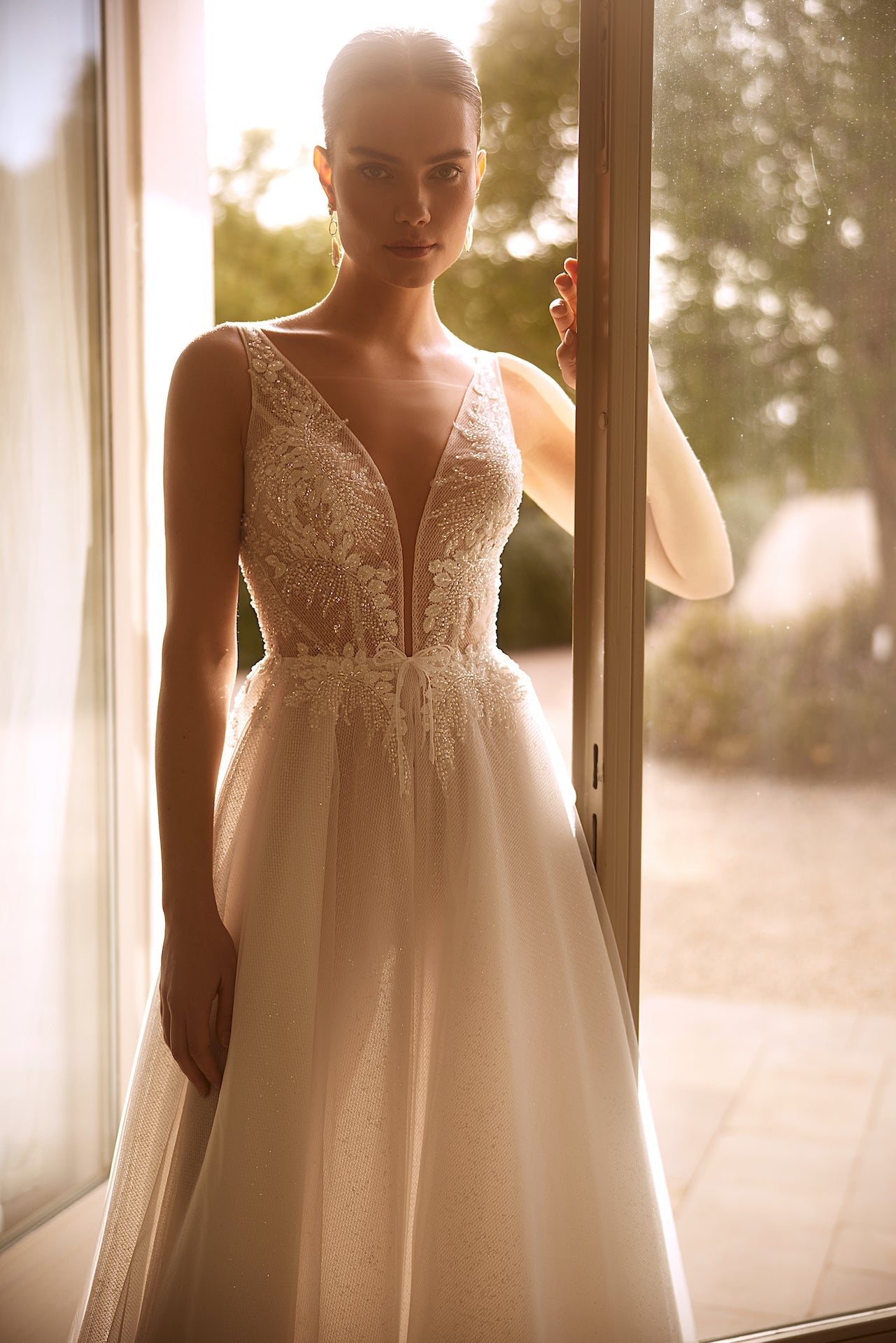 Wedding Dress with V-Neckline and Open Back